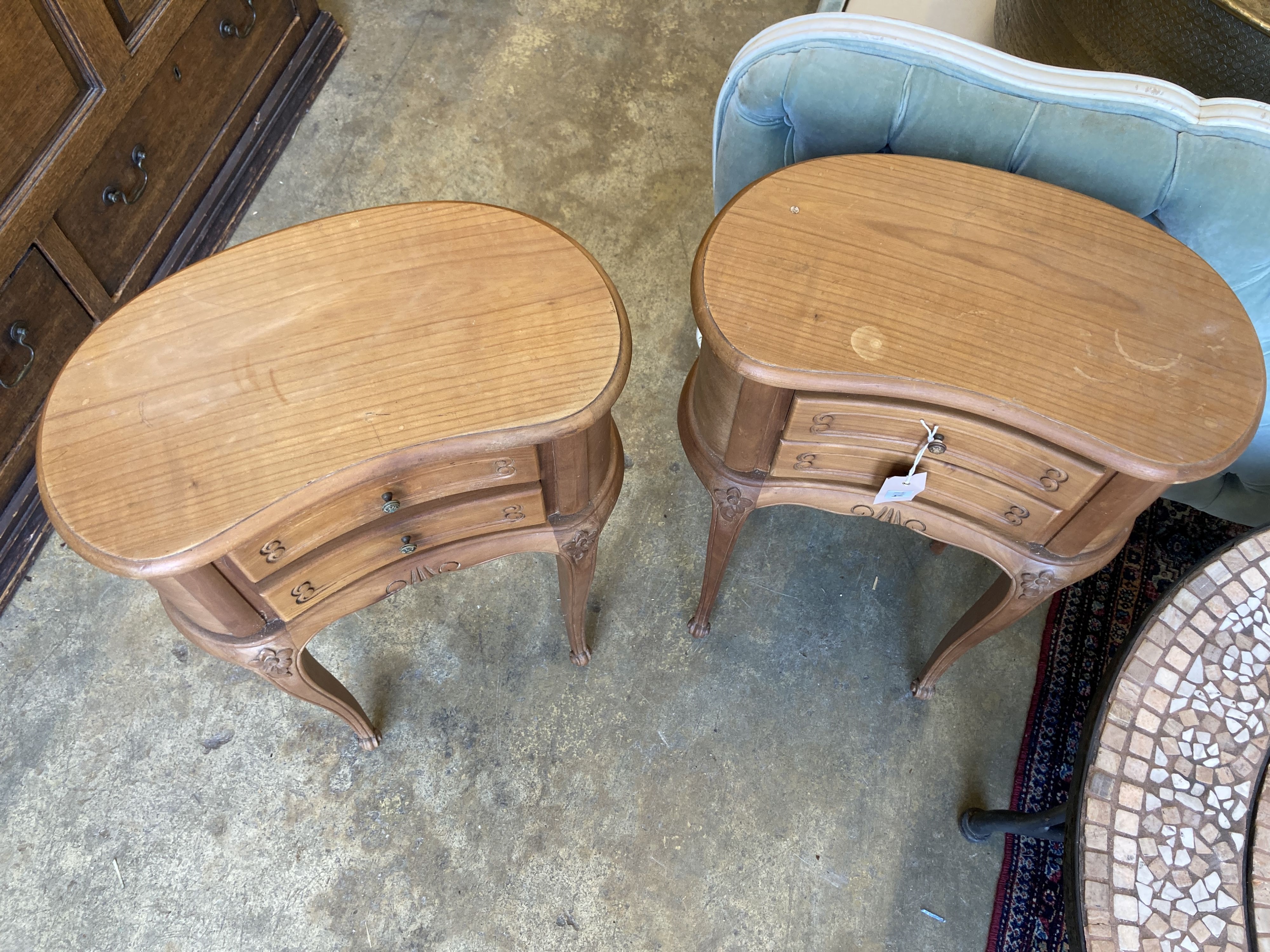 A pair of Louis XVI design walnut kidney-shaped bedside chests, width 45cm, depth 26cm, height 66cm